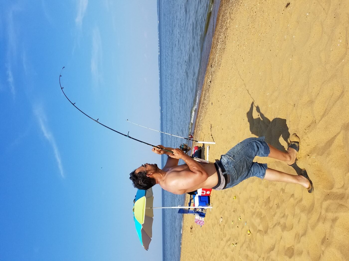 Fighting a fish from shore